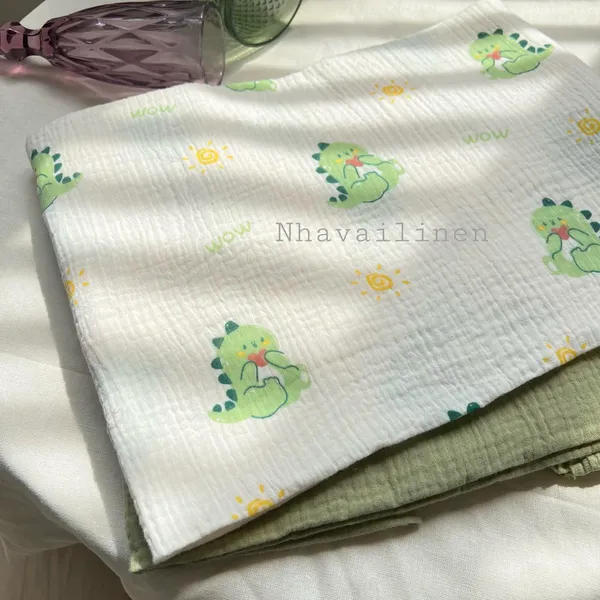 Vải xô muslin cao cấp 2 lớp hoạ tiết khủng long xanh