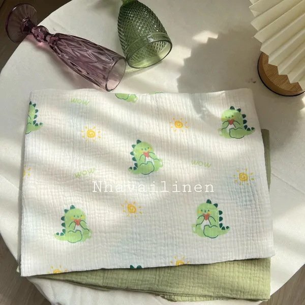 Vải xô muslin cao cấp 2 lớp hoạ tiết khủng long xanh