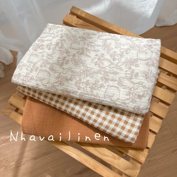 Vải xô muslin cao cấp 2 lớp hoạ tiết thỏ nâu loang