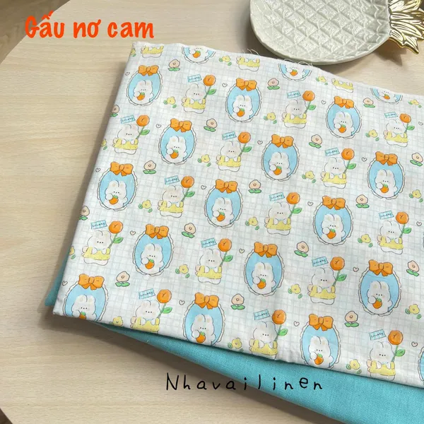 Vải Cotton Cao Cấp Hoạ Tiết Gấu Nơ Cam