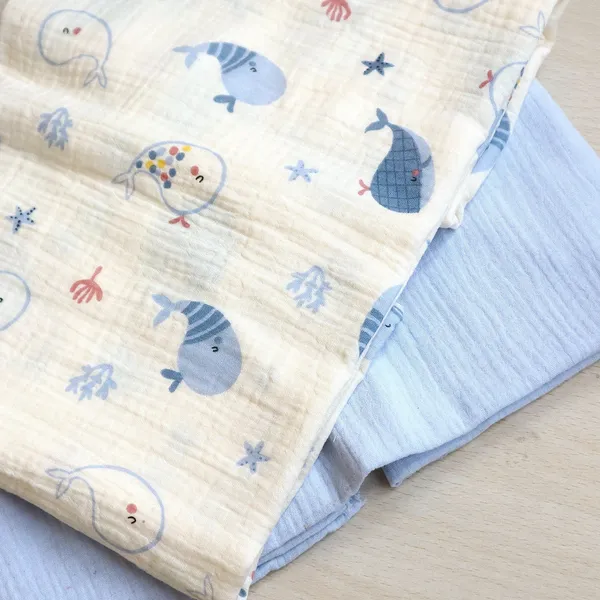 Vải xô muslin cao cấp 2 lớp hoạ tiết cá heo xanh