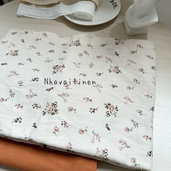 Vải thô cào bông hoạ tiết hoa hồng nâu