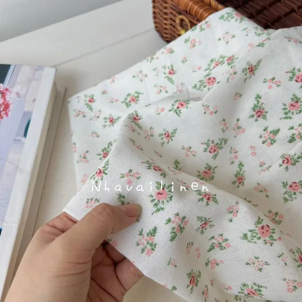 Vải linen bột hoa cam lá xanh