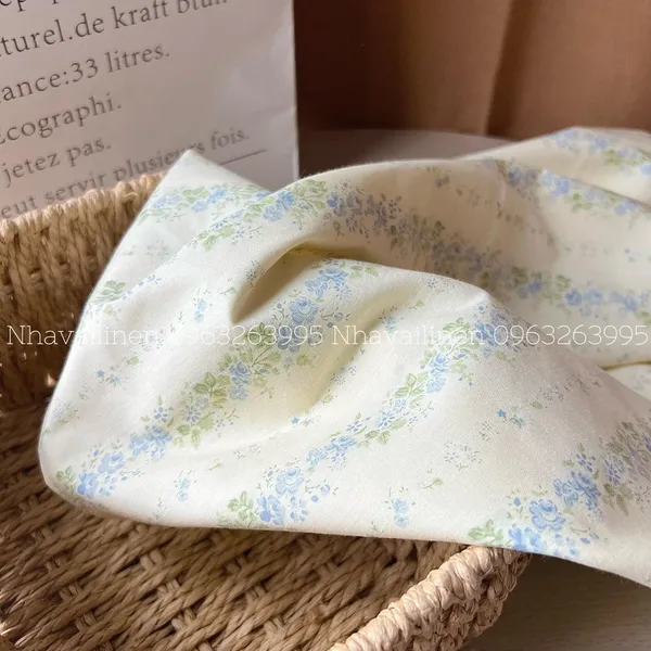 Vải cotton hoạ tiết hoa dây xanh nền be