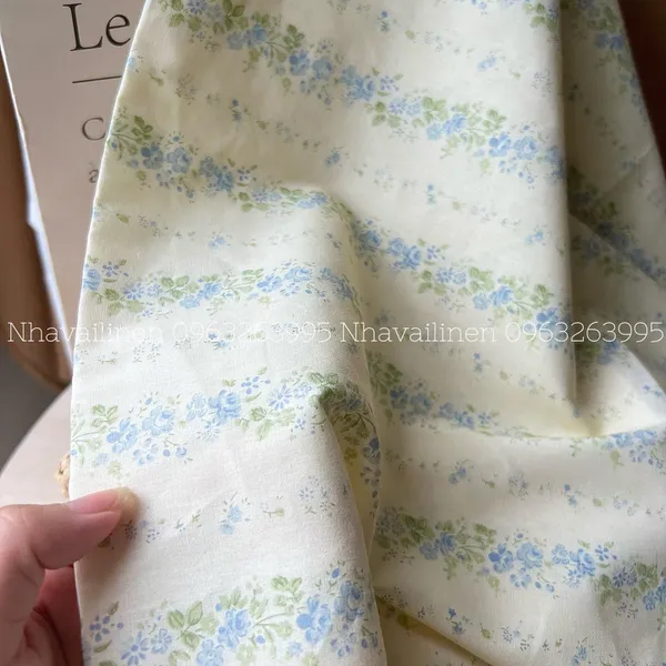 Vải cotton hoạ tiết hoa dây xanh nền be