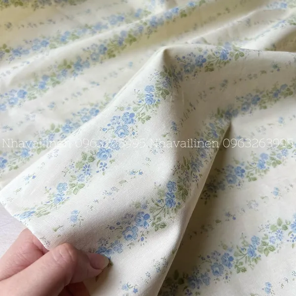 Vải cotton hoạ tiết hoa dây xanh nền be