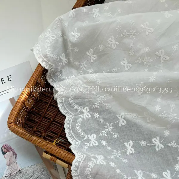 Vải boi thêu nơ rừng trắng