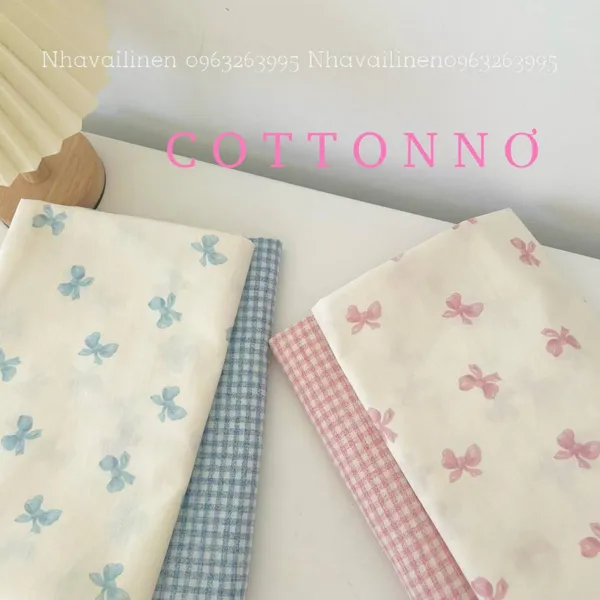 Vải cotton cao cấp hoạ tiết  nơ hồng