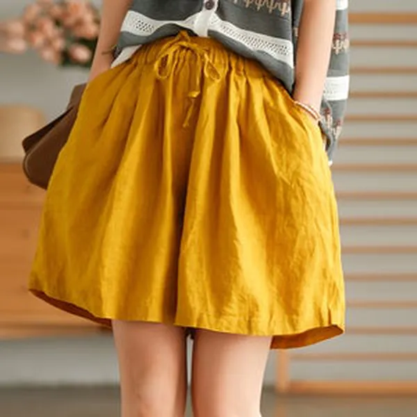 Gợi ý mẫu trang phục mùa hè sử dụng vải linen vàng