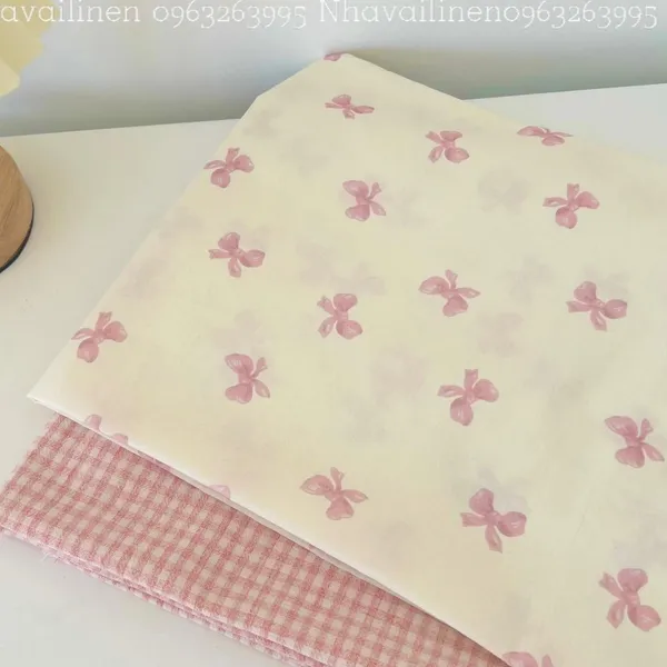 Vải cotton cao cấp hoạ tiết  nơ hồng