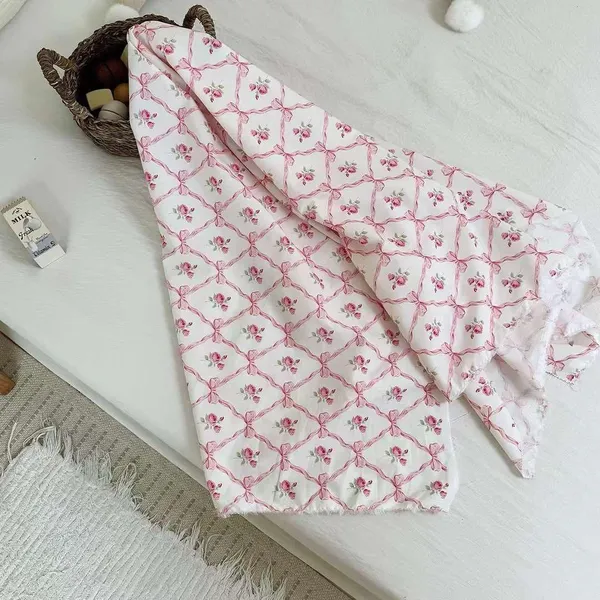 Vải cotton hoạ tiết ô nơ hoa hồng