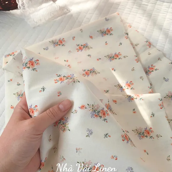 Vải cotton hoạ tiết hoa tím cam