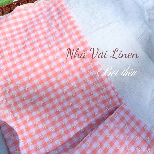 Vải boi thêu hoa nhí nền hồng