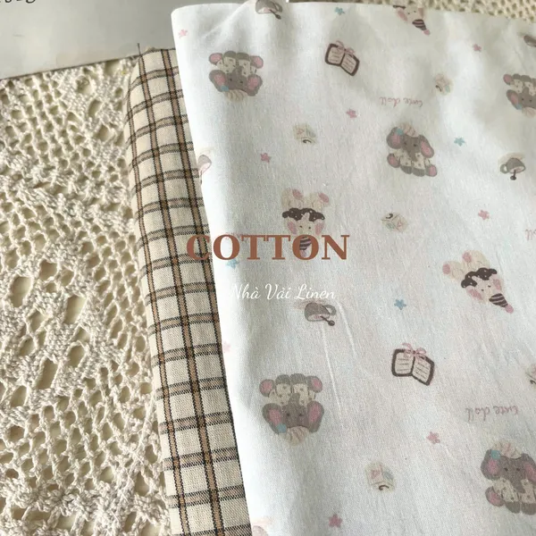 Vải cotton hoạ tiết voi sách