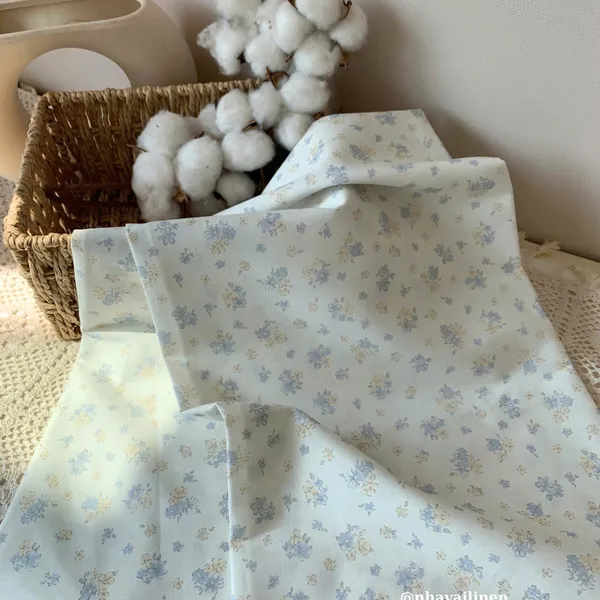 Vải cotton hoạ tiết hoa cúc nền trắng