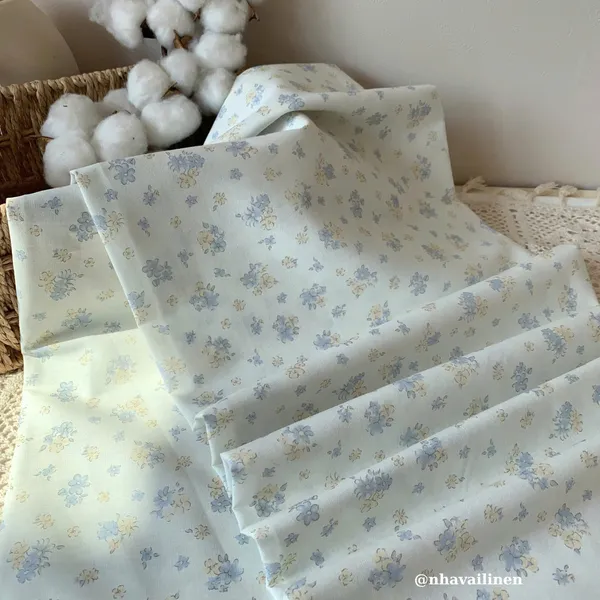Vải cotton hoạ tiết hoa cúc nền trắng