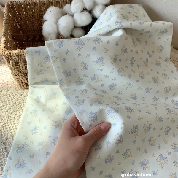 Vải cotton hoạ tiết hoa cúc nền trắng