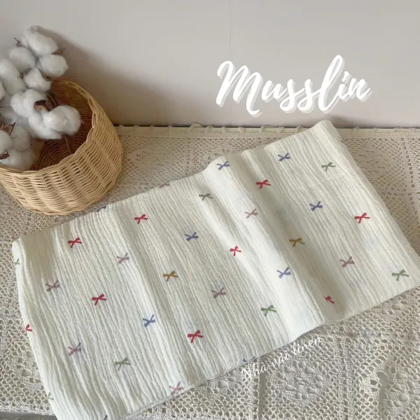 Xô muslin cao cấp 2 lớp hoạ tiết nơ ngũ sắc