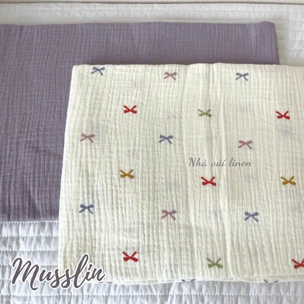 Xô muslin cao cấp 2 lớp hoạ tiết nơ ngũ sắc