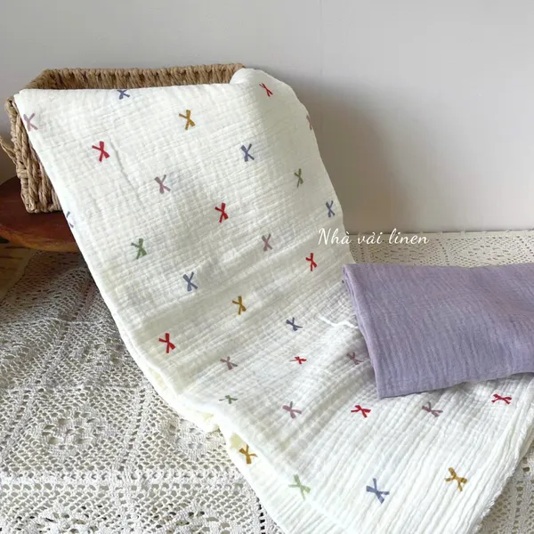 Xô muslin cao cấp 2 lớp hoạ tiết nơ ngũ sắc