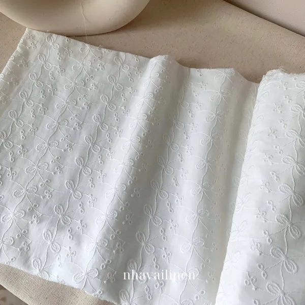 Vải boi thêu nơ dây