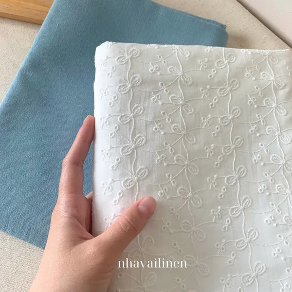 Vải boi thêu nơ dây