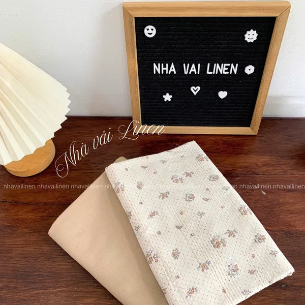 COTTON DỆT NỔI HOA NÂU CHẤM BI