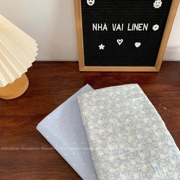 Xô muslin cao cấp 2 lớp hoạ tiết hoa trắng nền xanh