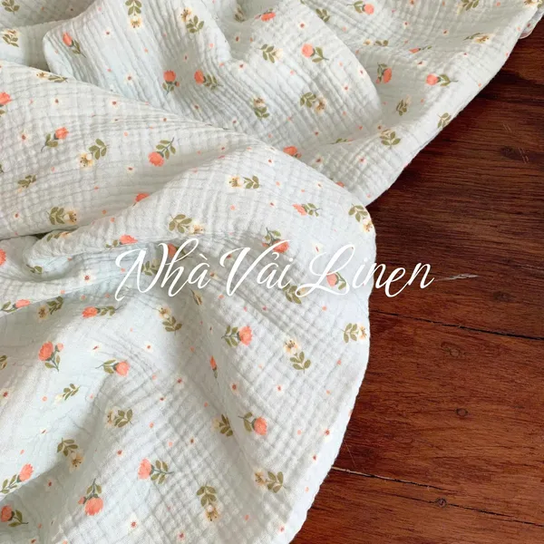 Xô muslin cao cấp 2 lớp hoạ tiết hoa tulip cam nền xanh