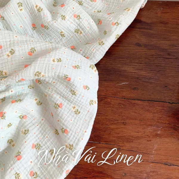 Xô muslin cao cấp 2 lớp hoạ tiết hoa tulip cam nền xanh