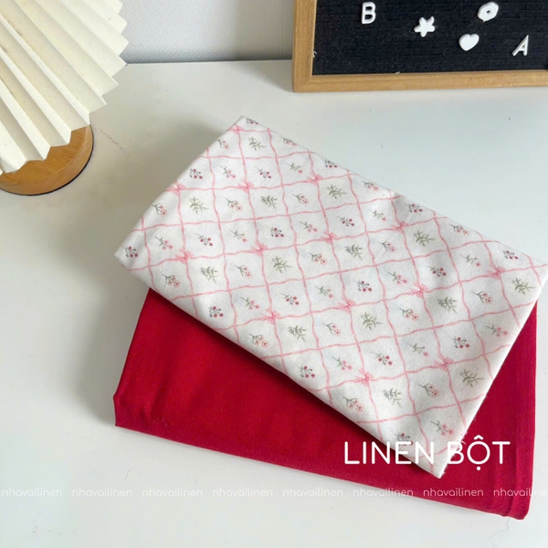 Vải linen bột ô chéo nơ hồng