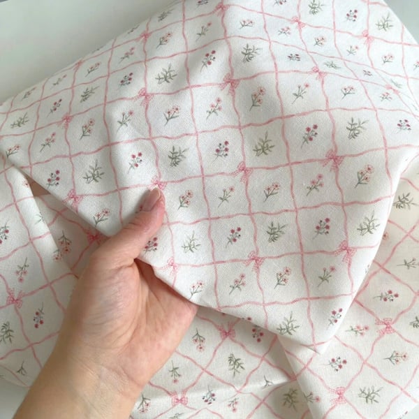Vải linen bột ô chéo nơ hồng