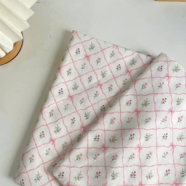 Vải linen bột ô chéo nơ hồng