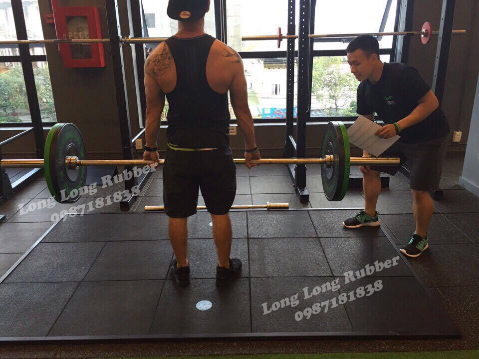 Black rubber gym flooring mat in Qatar Black rubber gym flooring mat in Qatar