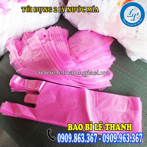 túi đựng 2 ly nước mía màu hồng zin gai túi đựng 2 ly nước mía màu hồng zin gai