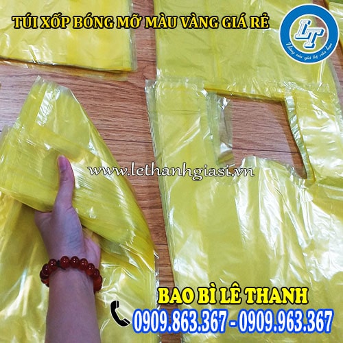 túi xốp bóng mỡ màu vàng size 30 dạng 2 quai xách túi xốp bóng mỡ màu vàng size 30 dạng 2 quai xách