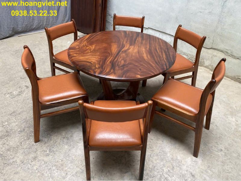 Bàn tròn gỗ me tây nguyên tấm 6 ghế bella Bàn tròn gỗ me tây nguyên tấm 6 ghế bella