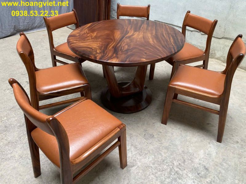 Bàn tròn gỗ me tây nguyên tấm 6 ghế bella Bàn tròn gỗ me tây nguyên tấm 6 ghế bella