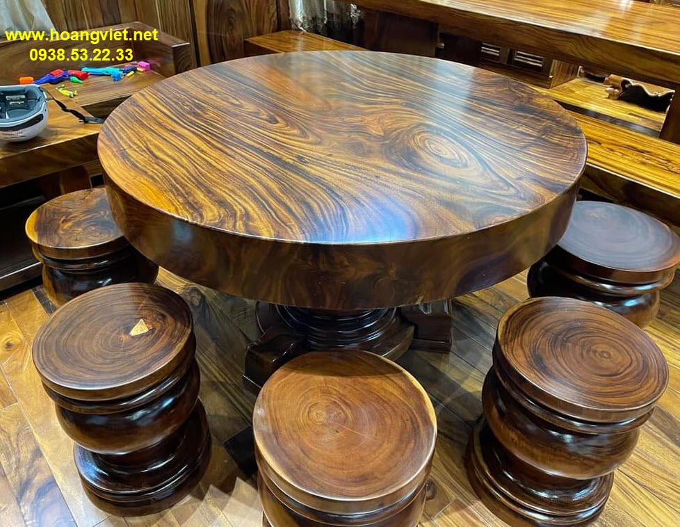 Bộ bàn tròn gỗ me tây nguyên khối 8 đôn. Bộ bàn tròn gỗ me tây nguyên khối 8 đôn.