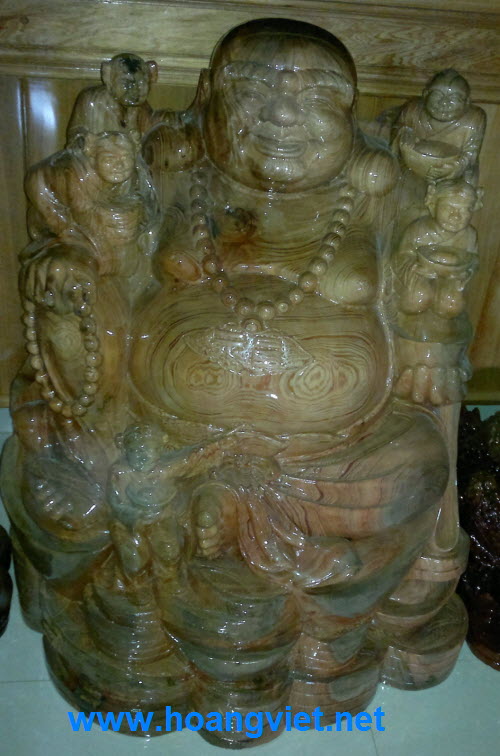 Tượng di lặc ngồi tiền với lũ trẻ Tượng di lặc ngồi tiền với lũ trẻ