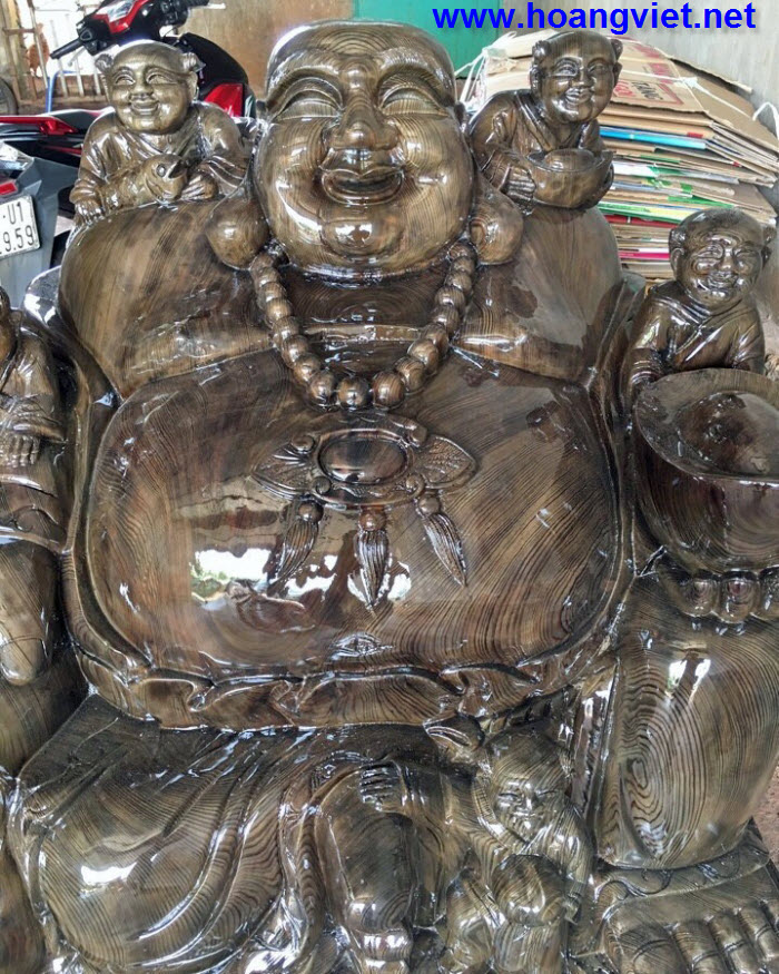 Tượng phật di lặc ngồi tiền bằng gỗ thủy tùng Tượng phật di lặc ngồi tiền bằng gỗ thủy tùng