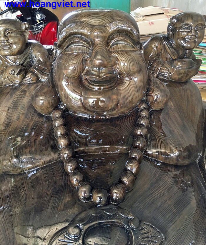 Tượng phật di lặc ngồi tiền bằng gỗ thủy tùng Tượng phật di lặc ngồi tiền bằng gỗ thủy tùng