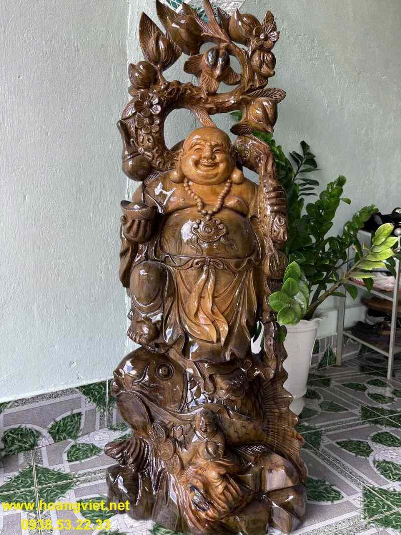 Phật di lặc gỗ thủy tùng cao 119cm rộng 47cm. Phật di lặc gỗ thủy tùng cao 119cm rộng 47cm.