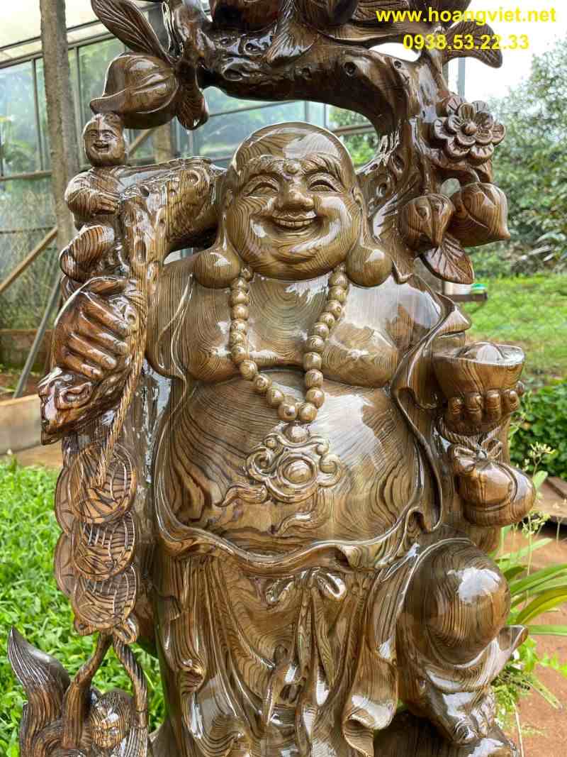 Phật di lặc vác cành đào gỗ thủy tùng Phật di lặc vác cành đào gỗ thủy tùng