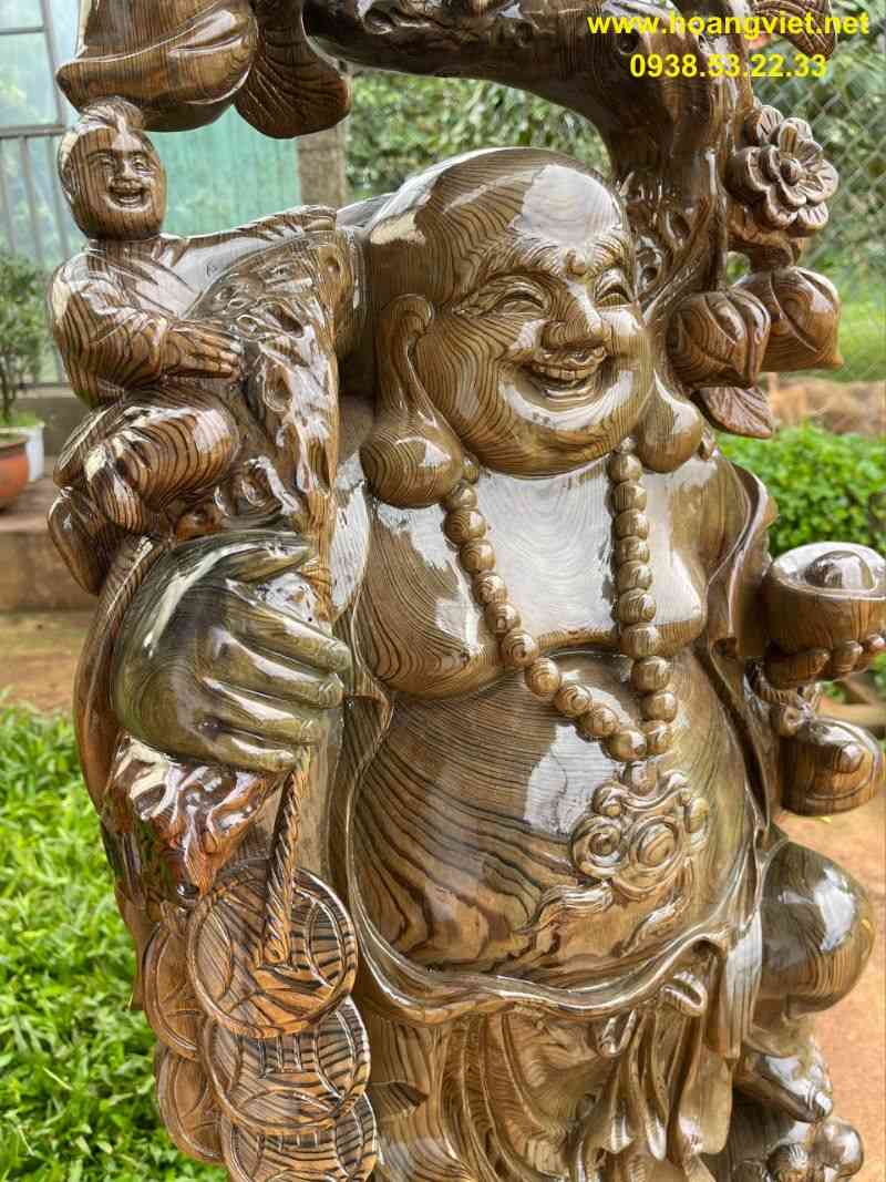 Phật di lặc vác cành đào gỗ thủy tùng Phật di lặc vác cành đào gỗ thủy tùng