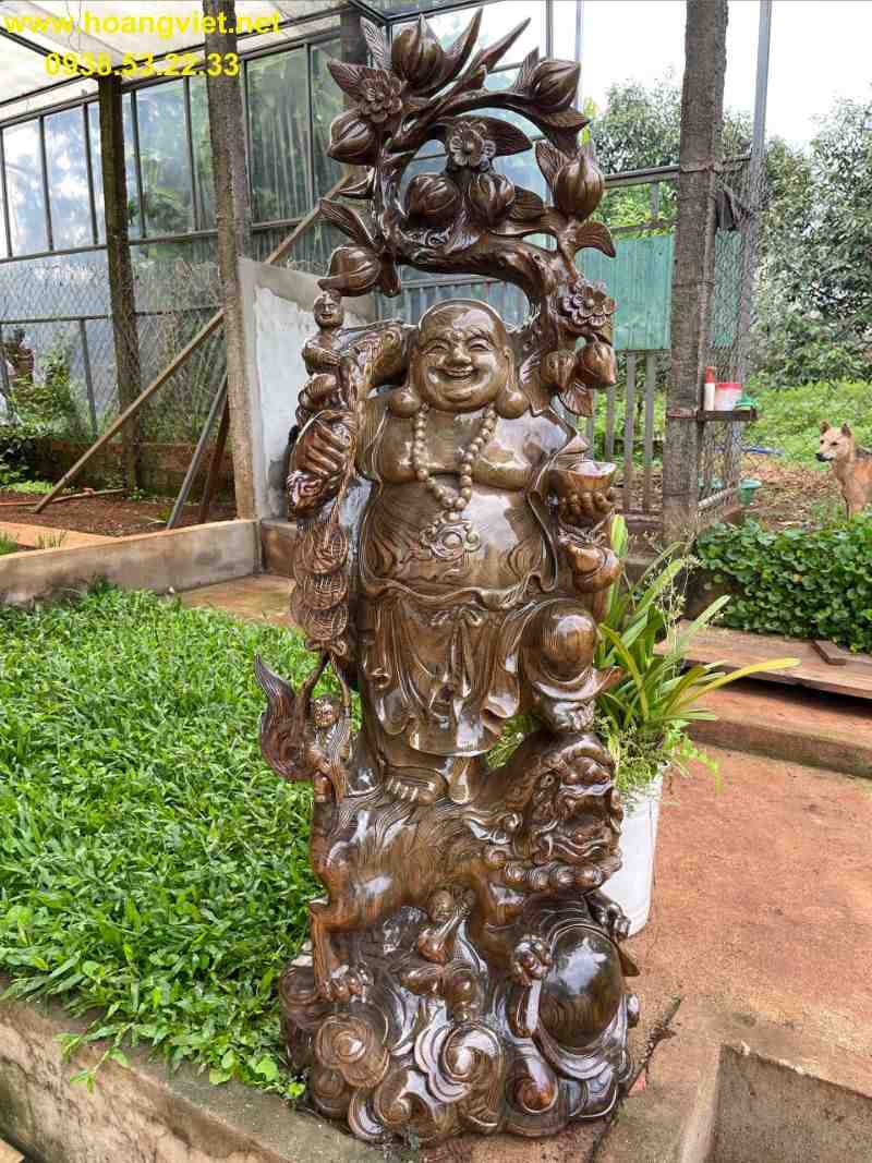 Phật di lặc vác cành đào gỗ thủy tùng Phật di lặc vác cành đào gỗ thủy tùng