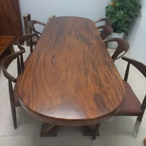 Bàn ăn oval gỗ me tây 6 ghế 84x7x233cm.