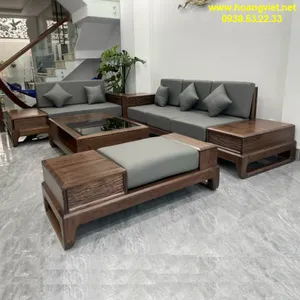 Bàn ghế sofa gỗ óc chó phòng khách nệm simili cao cấp.