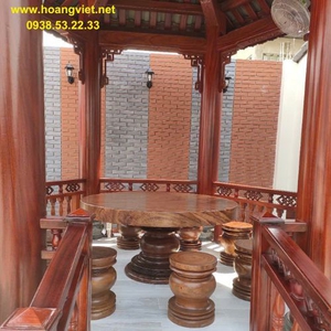 Bàn gỗ me tây tròn nguyên khối