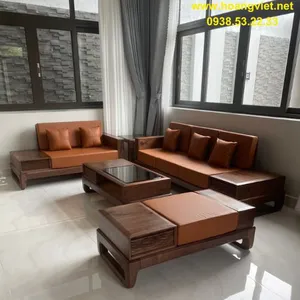 Sofa gỗ óc chó phòng khách nệm da bò thật.